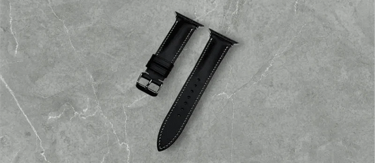 Sleek Black Nappa Leather Apple Watch band on a wrist, showcasing its luxurious finish