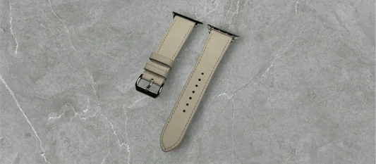 Sleek white French Swift leather Apple Watch band on a minimalist background, showcasing elegance