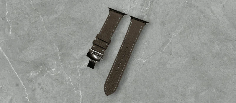 Elegant Grey Epsom leather Apple Watch band displayed on a sleek background