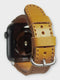 Apple watch bands in chic light orange Buttero leather, perfect for adding a vibrant, fashionable touch to your attire.