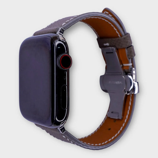 Refined leather Apple Watch band in grey Epsom leather, epitomizing luxury and resilience.