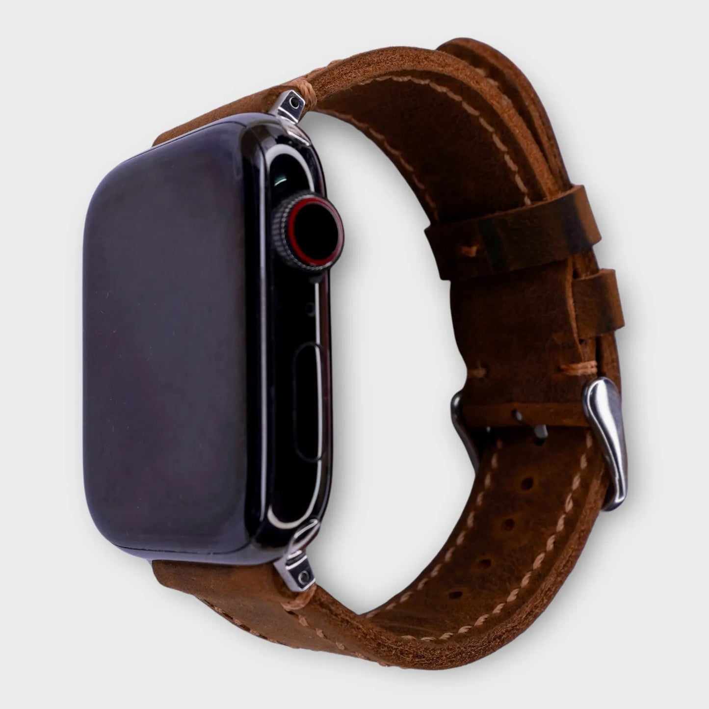 Elegant leather Apple Watch band made with high-quality brown waxy leather.