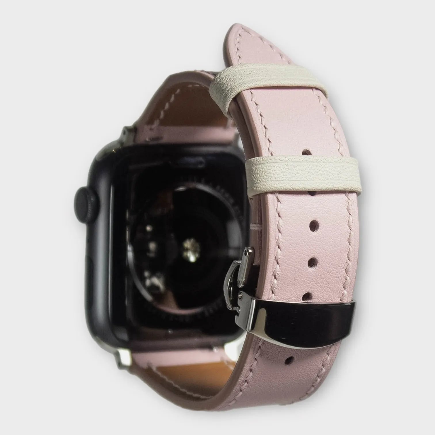 Apple watch bands in chic pink Swift leather, sophisticated design for a modern look.