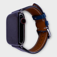 Elegant leather Apple Watch band with a striking blue to black Veg leather gradient.
