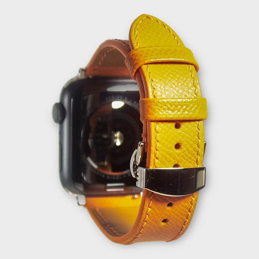 Apple watch bands in vibrant orange Epsom leather, adding a bold and bright touch to your daily wear.