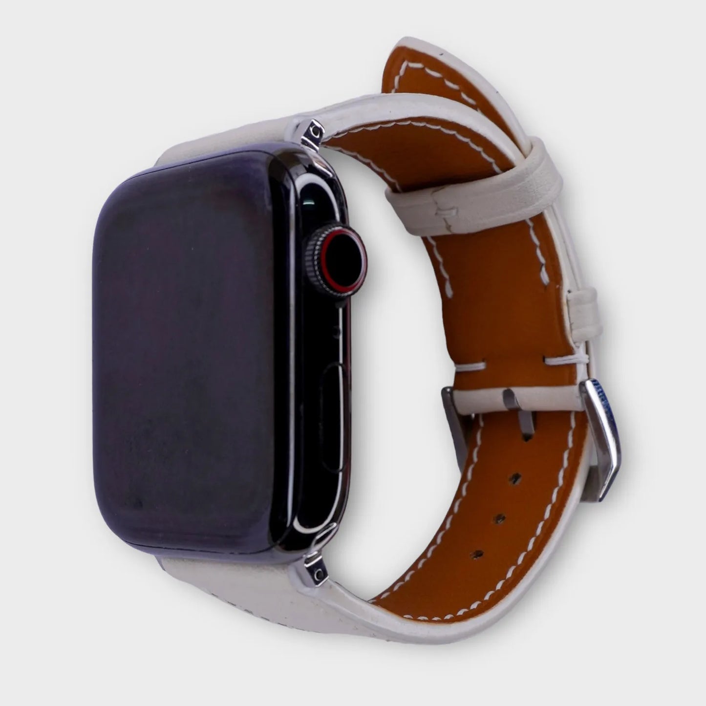 Luxurious leather Apple Watch band crafted from white French Swift leather, exquisitely detailed.