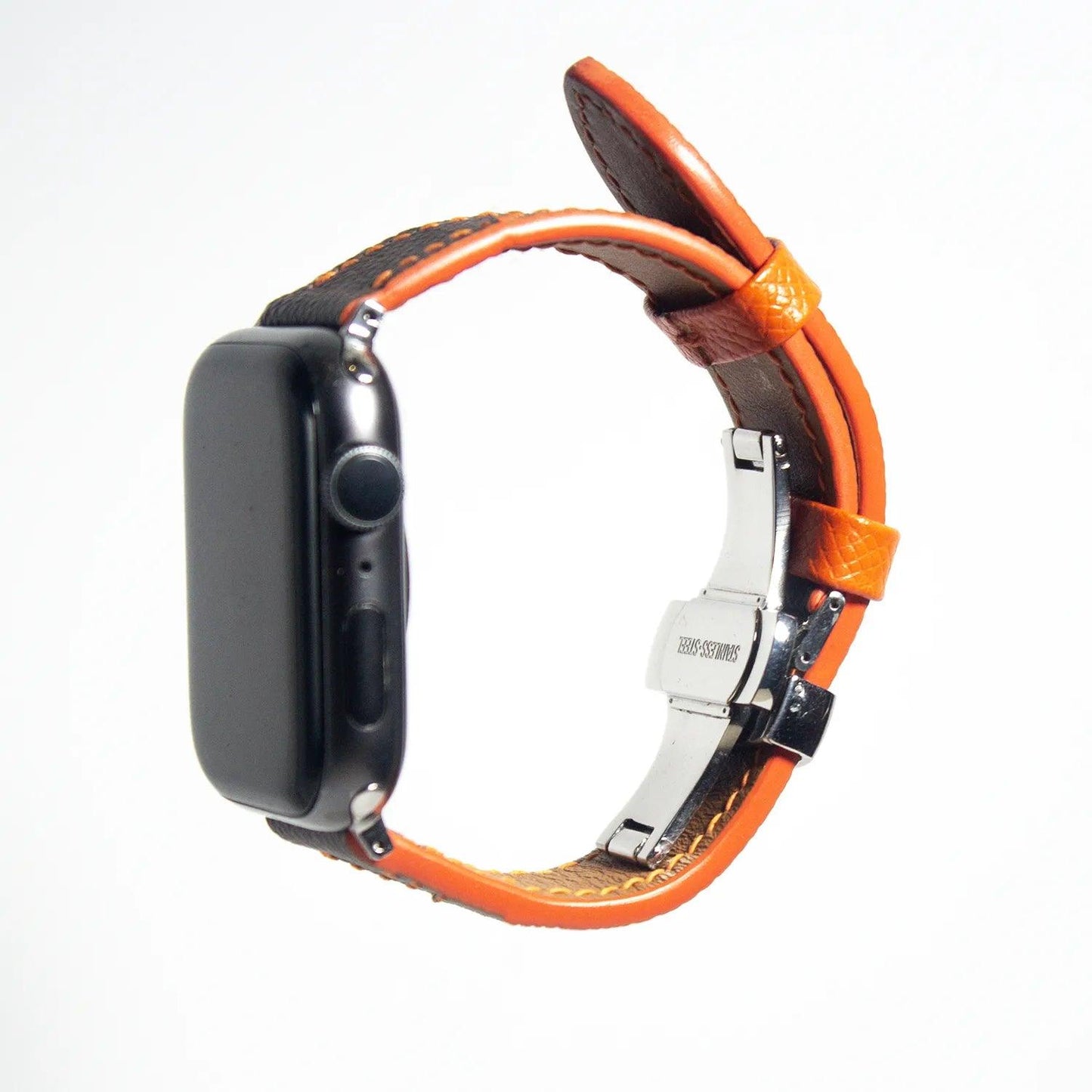 Distinctive apple watch leather band made from brown Epsom leather, accented with orange stitching for a unique finish.