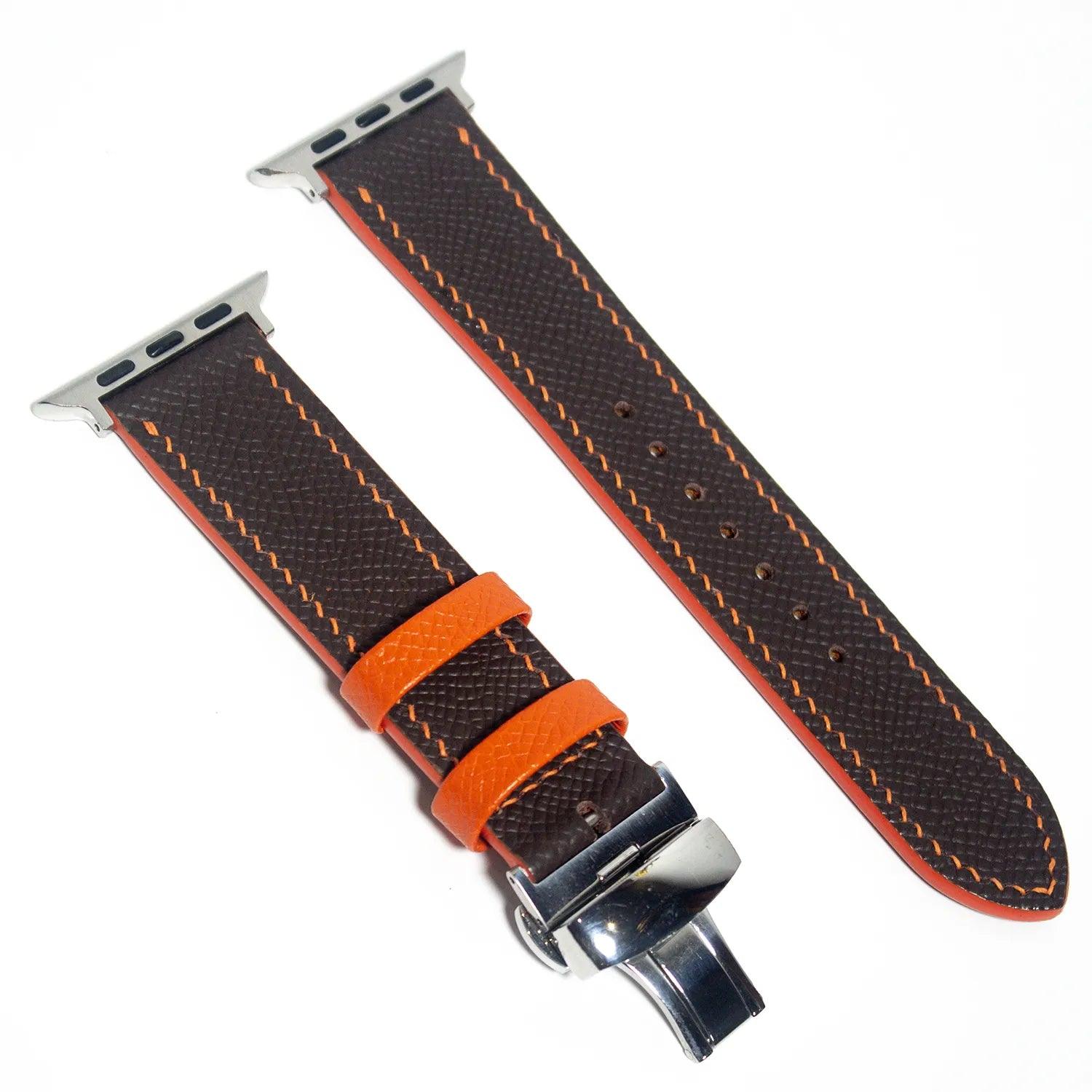 Elegant leather Apple Watch band in brown Epsom leather, enhanced with orange stitching, merging durability with style.