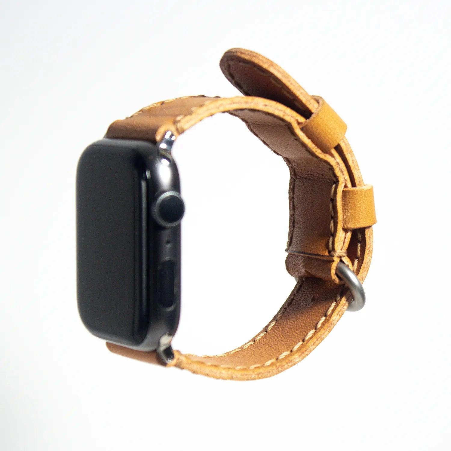 Elegant apple watch leather band crafted from light orange Buttero leather, designed for a chic and modern look.