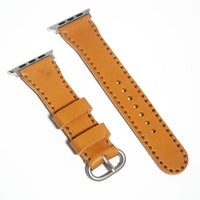 Stylish leather Apple Watch band in light orange Buttero leather, combining luxury with a playful color palette.