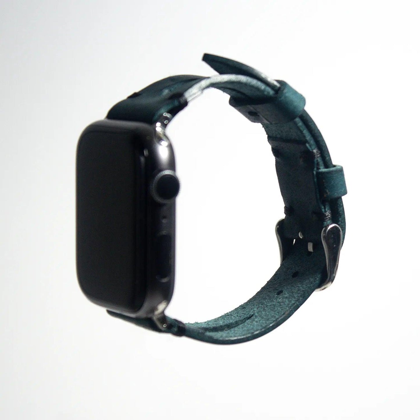 Refined apple watch leather band crafted from dark cyan Pueblo leather, a testament to Italian artistry.