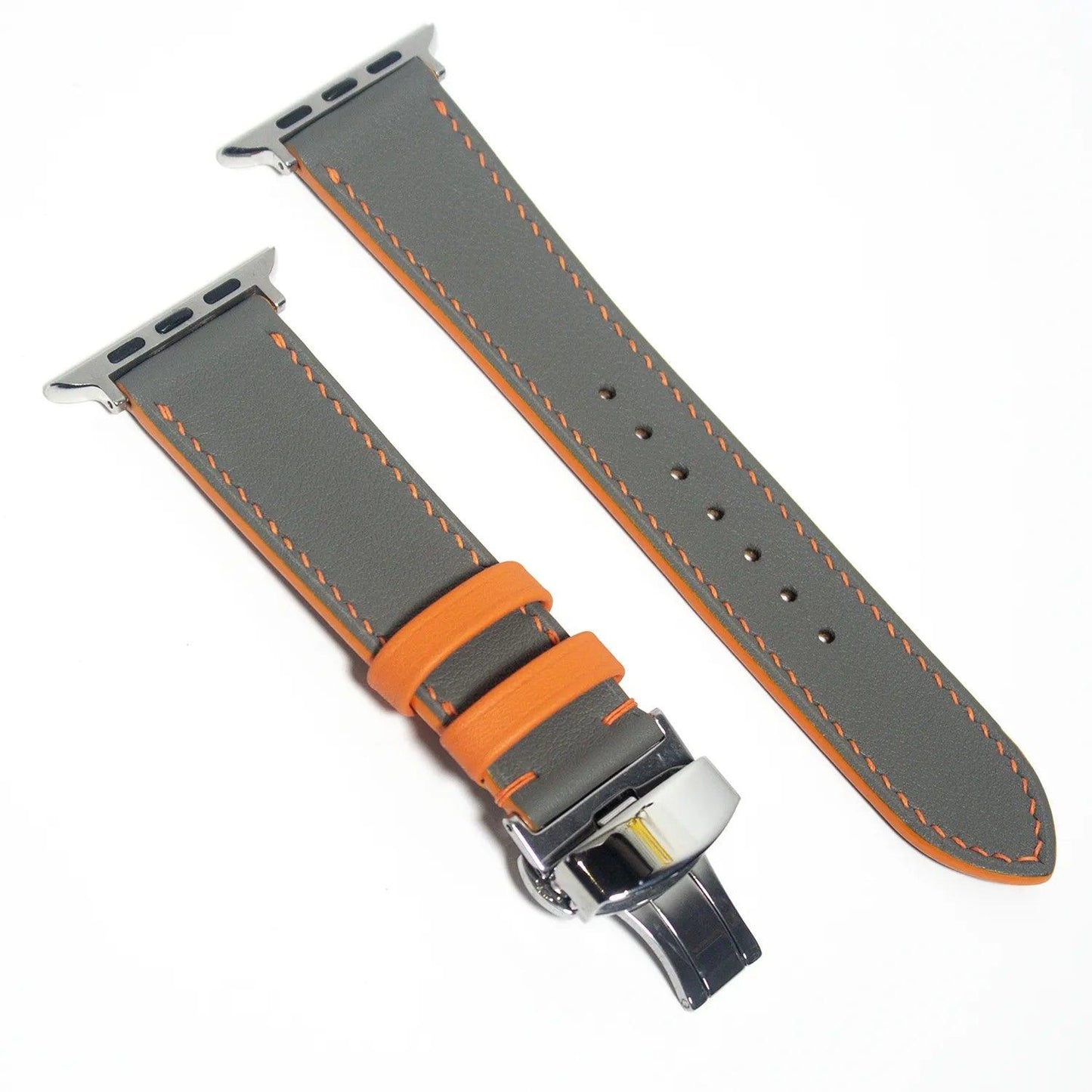 Chic leather Apple Watch band featuring gray Swift leather with distinctive orange stitching for a modern look.
