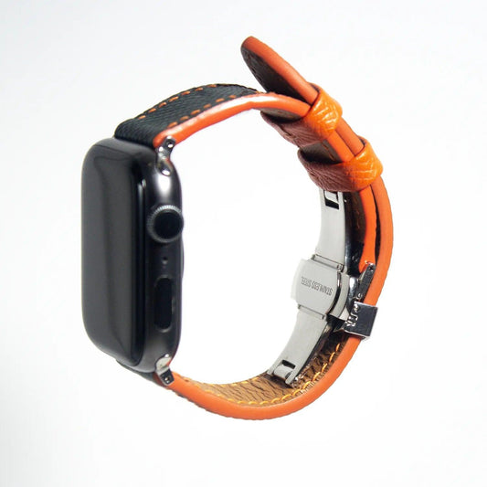 Stunning apple watch leather band in green Epsom leather accented with orange stitching, perfect for adding a pop of color.