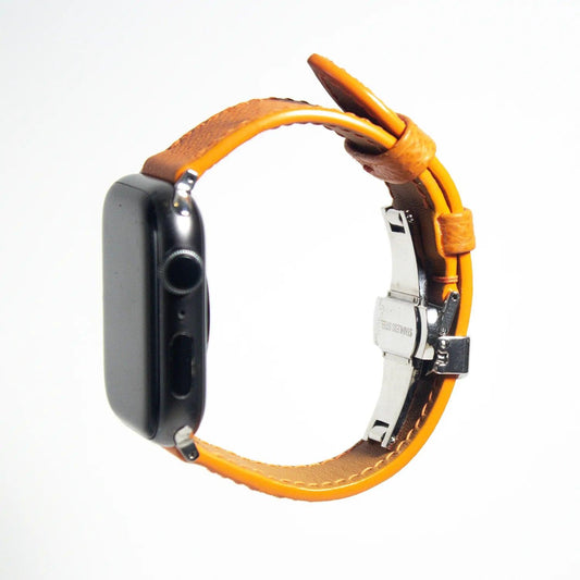 Striking apple watch leather band crafted from vibrant orange Epsom leather, perfect for a standout accessory.