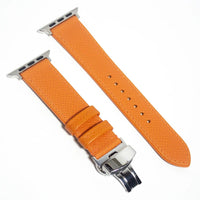 Stylish leather Apple Watch band in vibrant orange Epsom leather, designed to catch the eye and elevate any outfit.